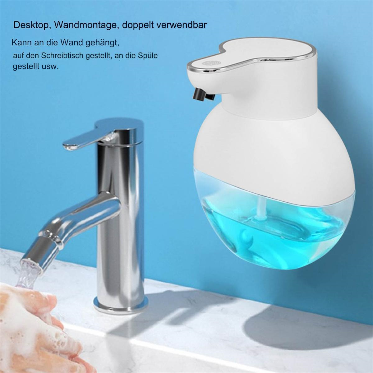 Automatischer Seifenspender, weiß und transparent, neben einem silbernen Wasserhahn und blauer Flüssigkeit.