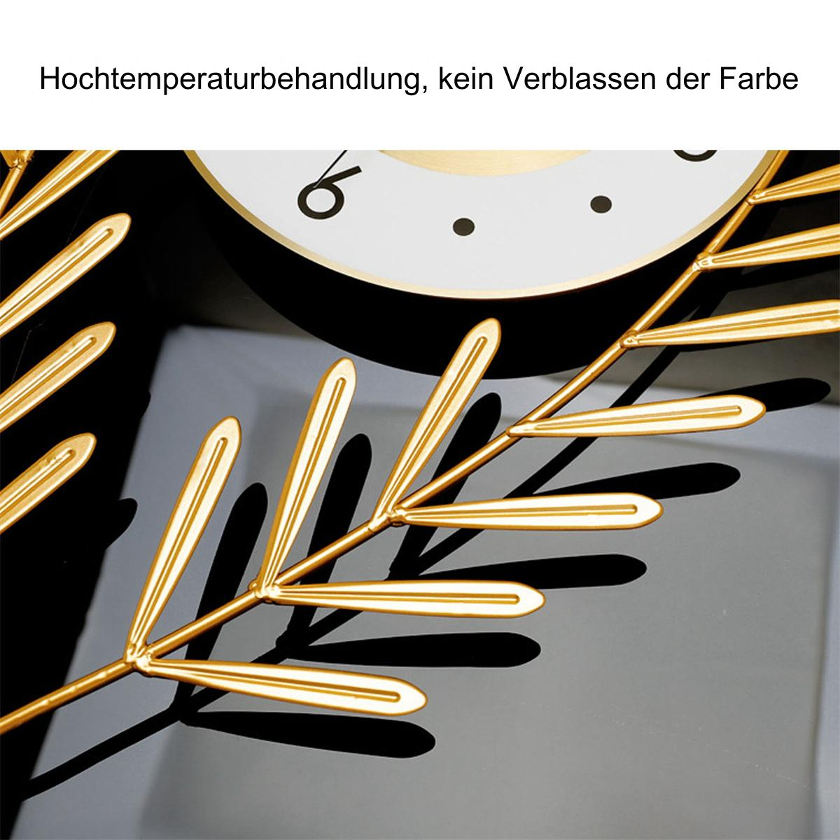 Nahaufnahme der Uhr, goldene Blätter, deutscher Text über Farbe.