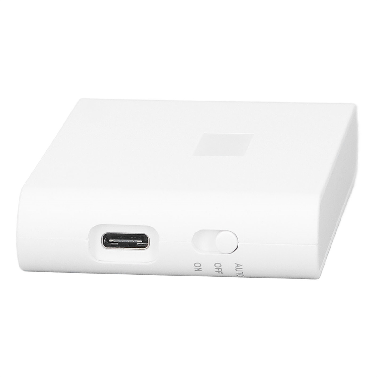 Ein weißes Gerät mit USB-Anschluss und Ein/Aus/Auto-Schalter. Das Gerät hat eine rechteckige Form.