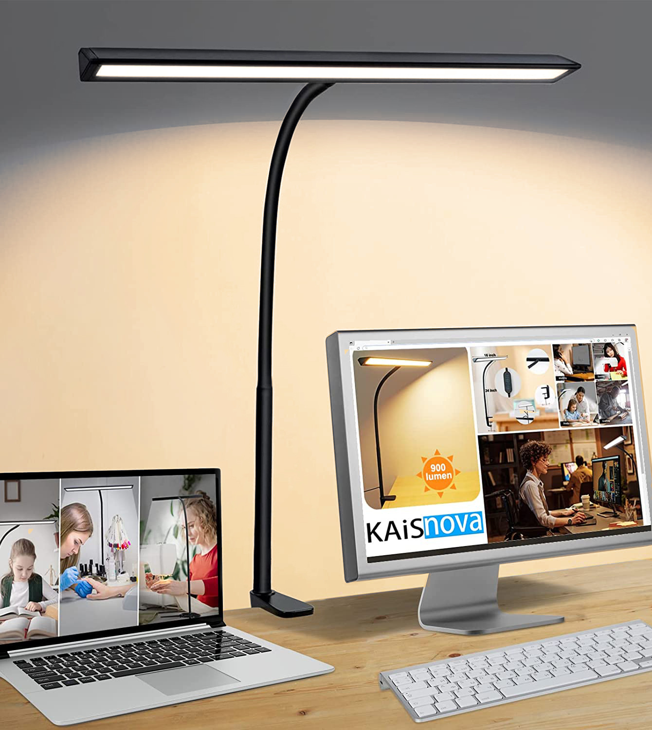 Moderne bureau-opstelling met verstelbare zwarte lamp, laptop, monitor en toetsenbord op houten bureau.