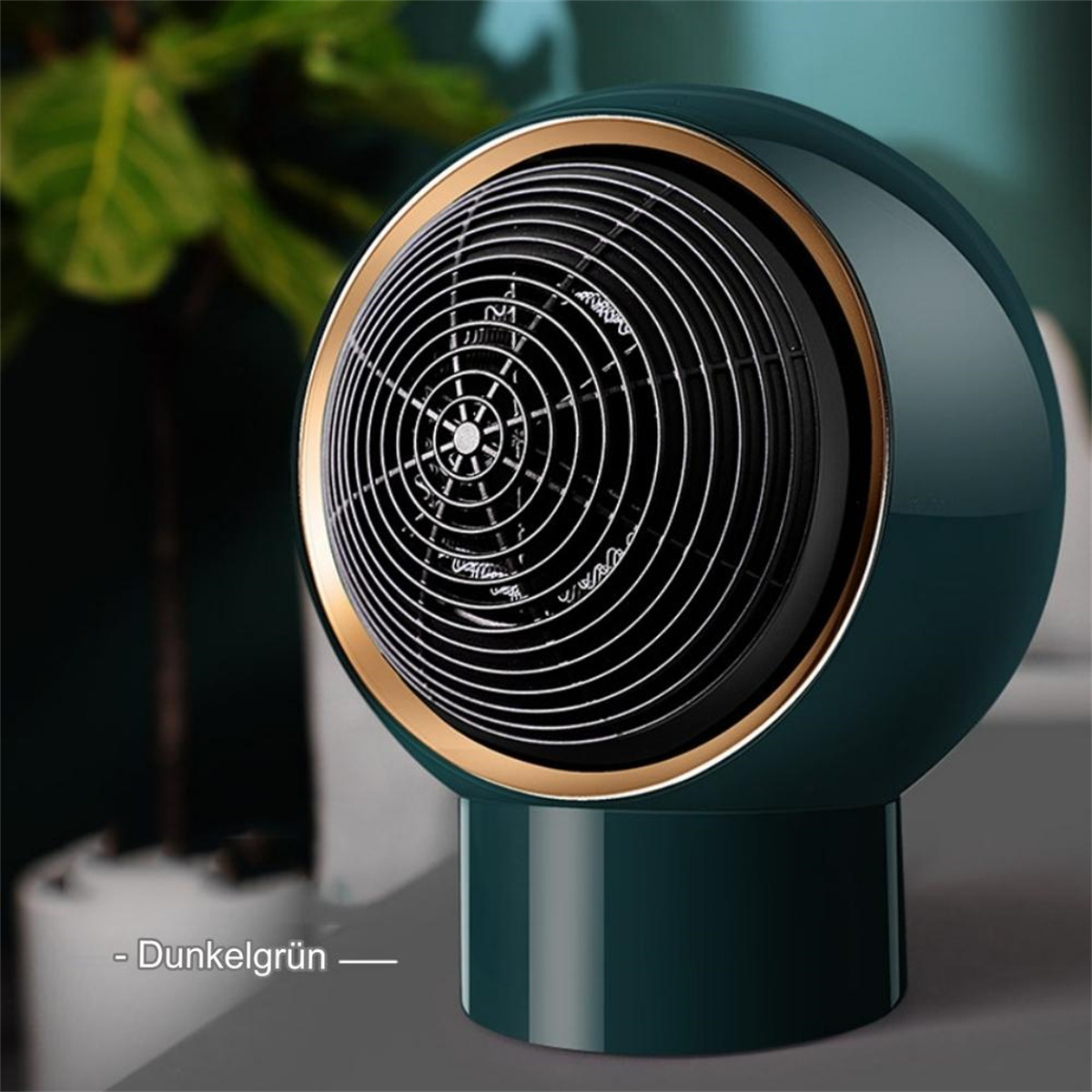 Ein dunkelgrüner, runder Heizlüfter mit goldenem Rand und fächerartigem Design.