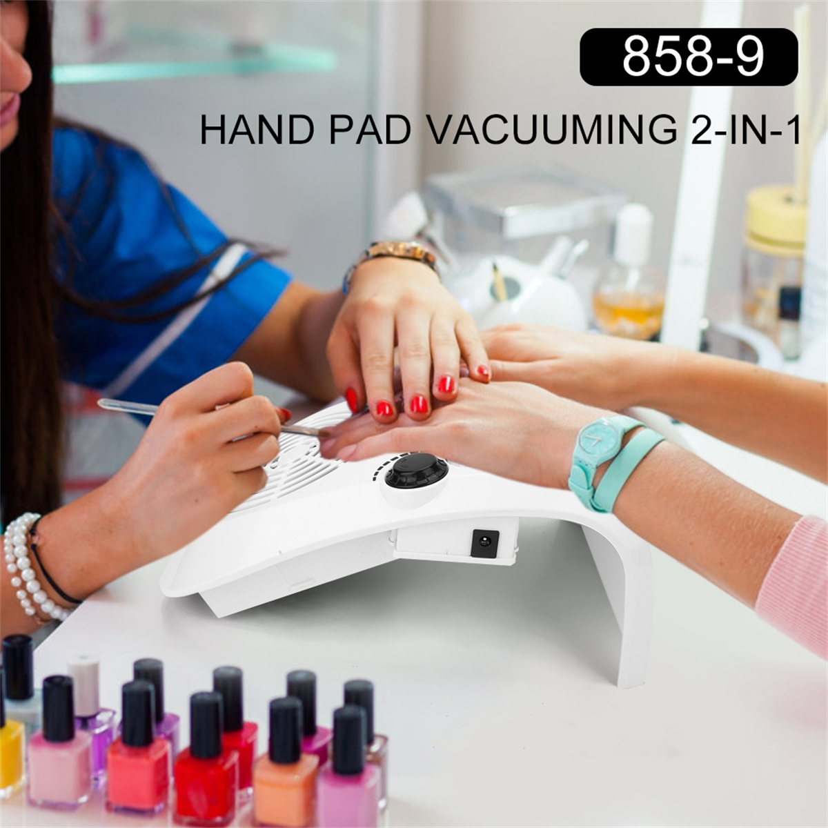 Manikürtisch mit Handpad-Absaugung und Nagellackflaschen.