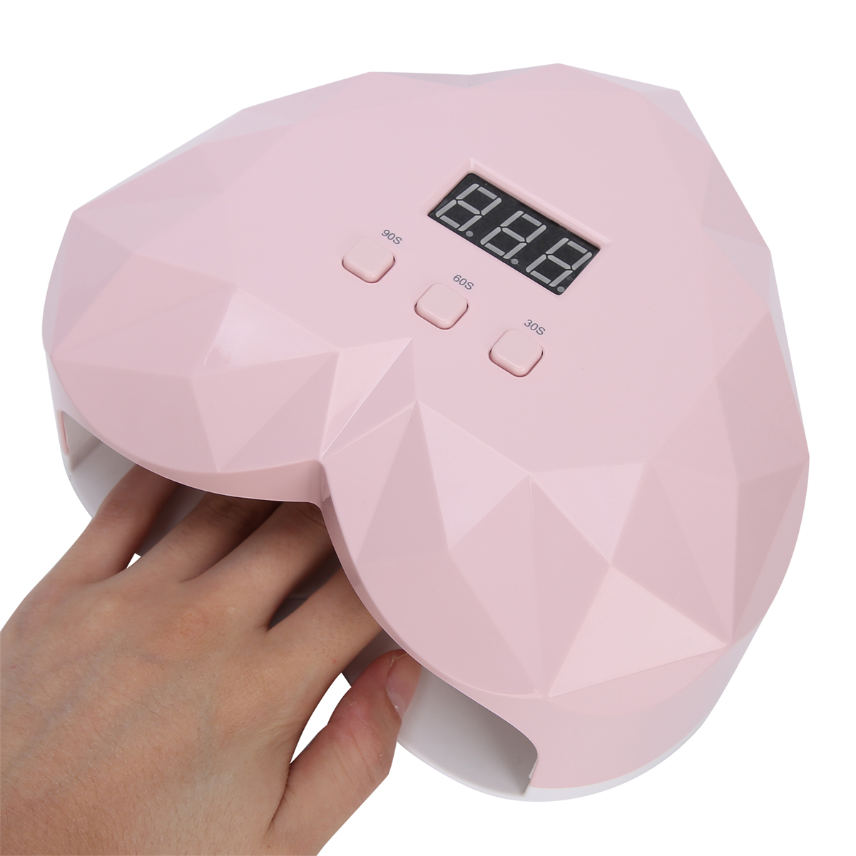 Rosa herzförmiger Nageltrockner mit Digitalanzeige und Tasten für Zeiteinstellungen.