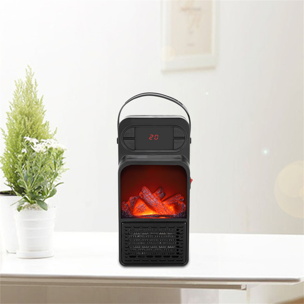 Schwarzer Elektrokamin auf einem Tisch. Es hat ein Display und einen Griff. Rote Lichter imitieren brennendes Holz.