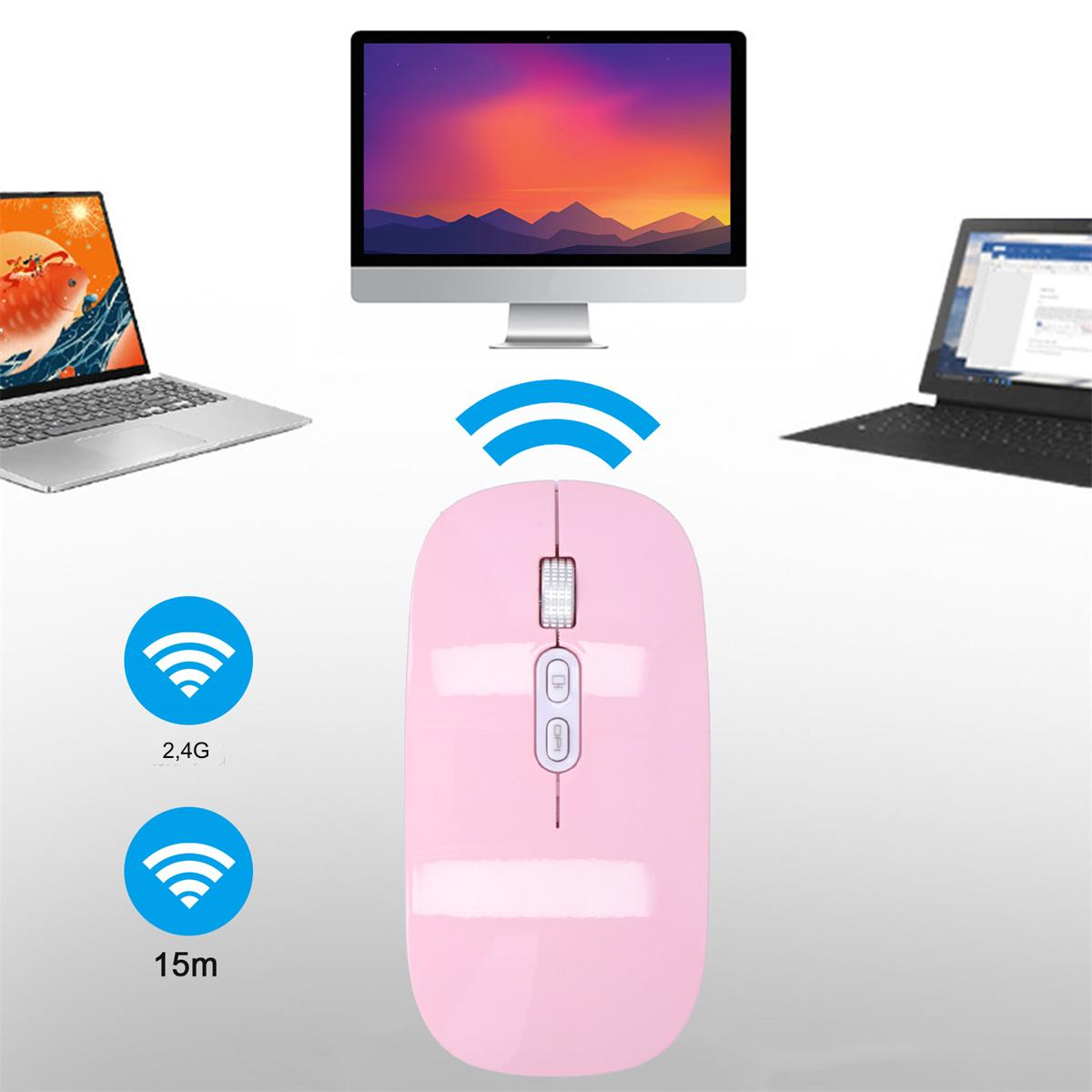 Eine rosa kabellose Maus mit zwei Laptops und einem Computermonitor im Hintergrund.