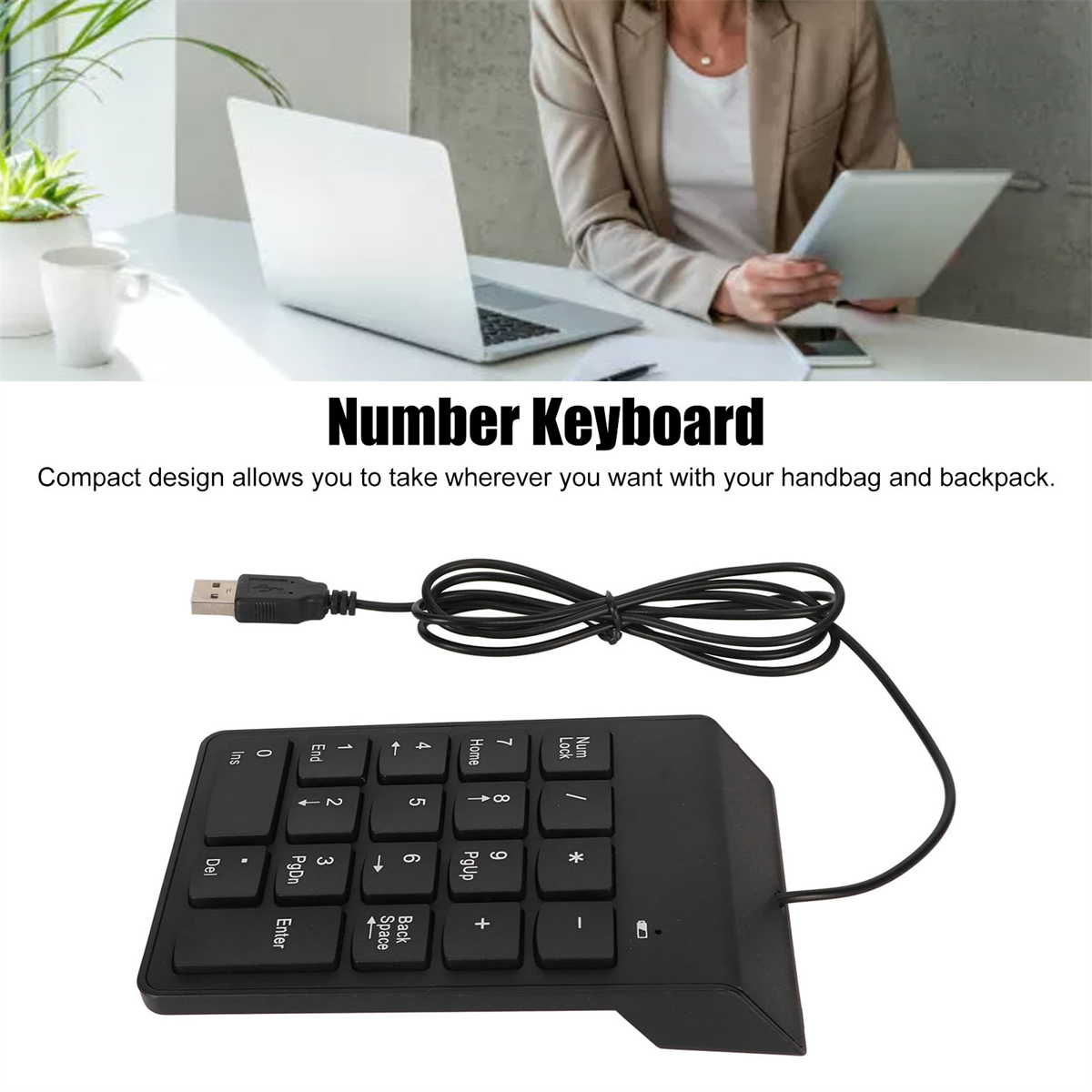 Eine schwarze Zifferntastatur mit einem USB-Kabel. Ein Laptop und eine Person sind im Hintergrund.