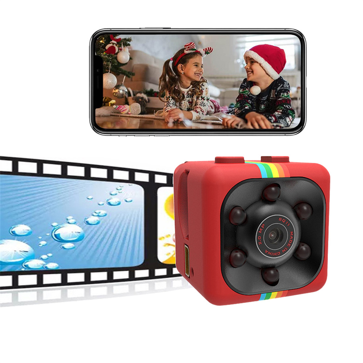 Eine kleine rote Kamera mit Regenbogenstreifen, die ein Video auf einem Telefon filmt, das zwei Kinder zeigt.