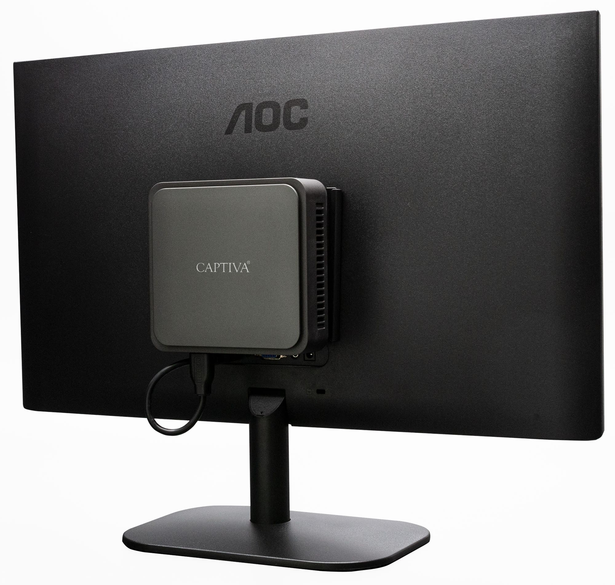 Tył czarnego monitora AOC z dołączonym srebrnym mini PC Captiva. Podtrzymuje go czarny stojak.