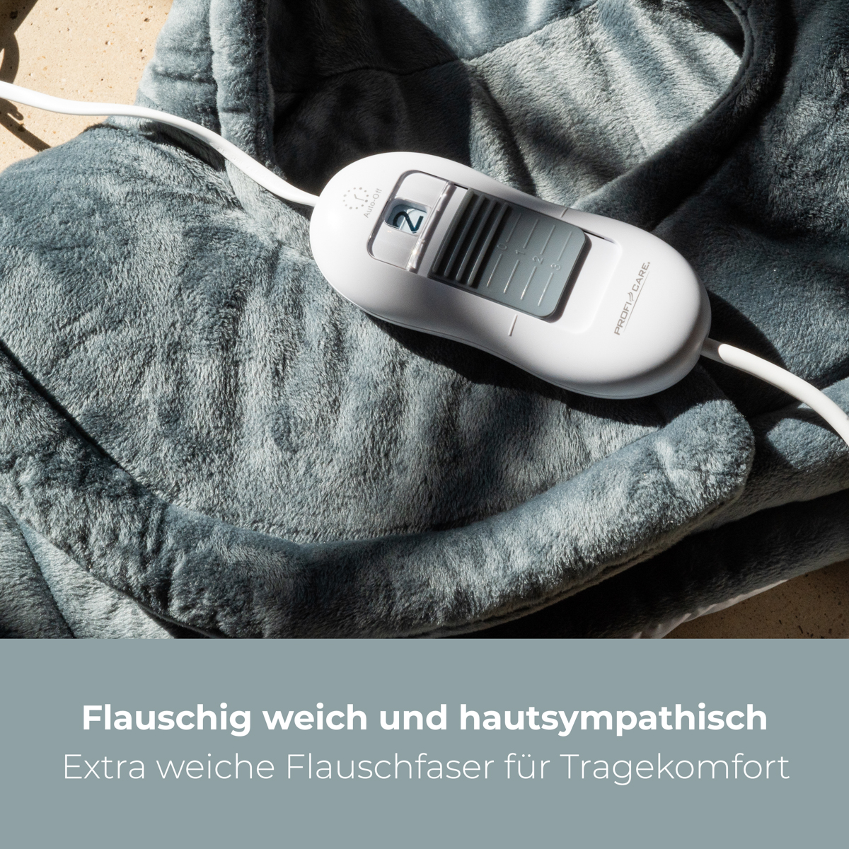 Szara elektryczna poduszka grzewcza z białym panelem sterowania na teksturowanej powierzchni.