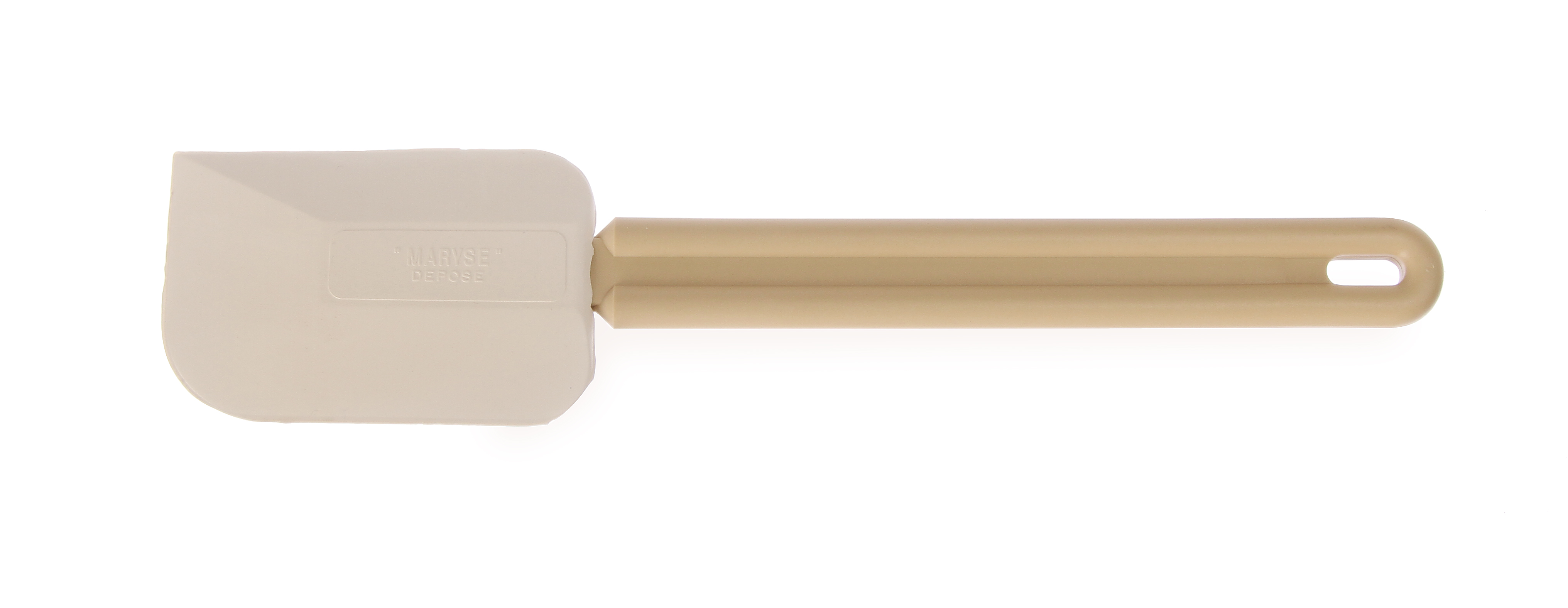 Una spatola beige con manico beige. È su sfondo bianco.