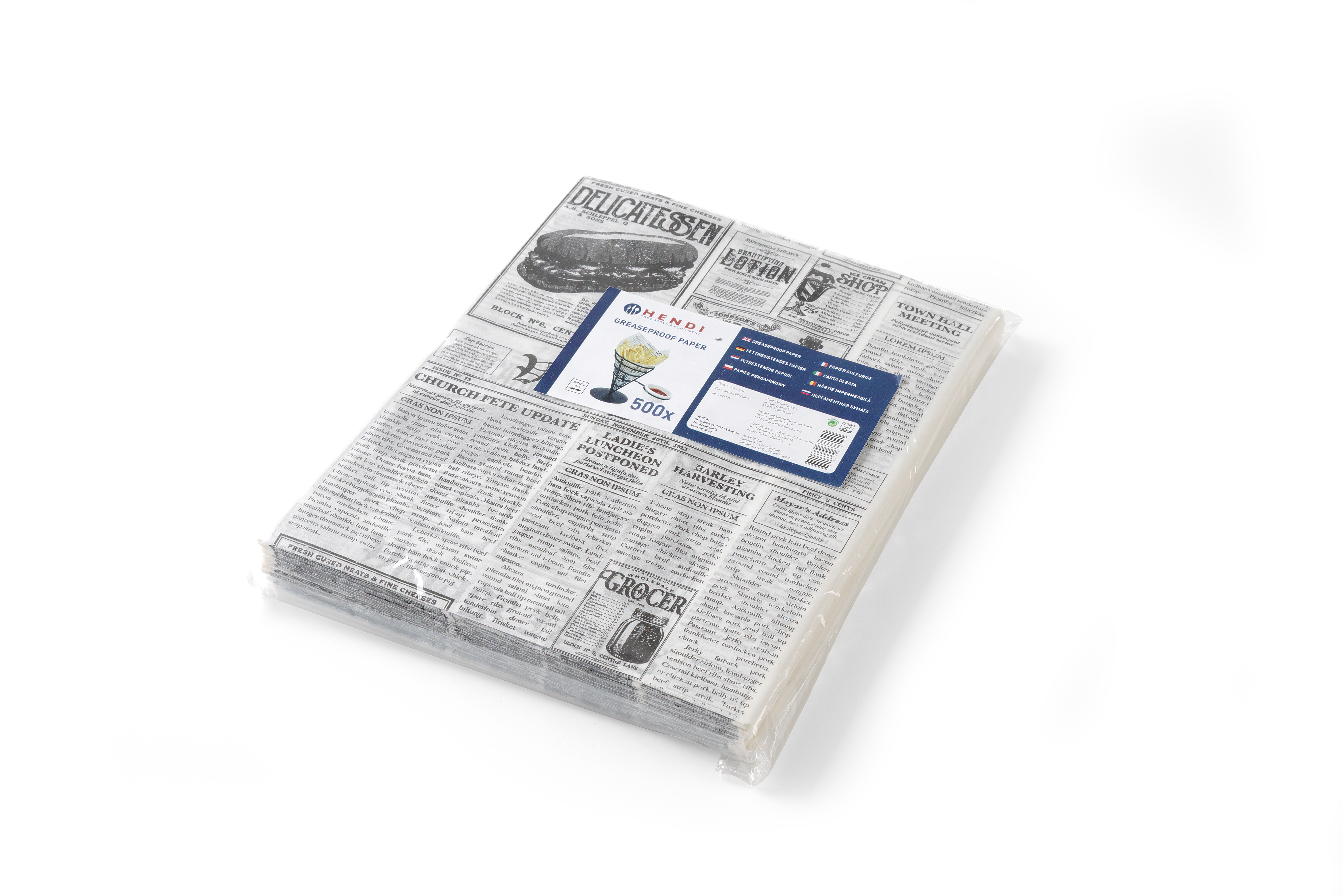 Fogli di carta per alimenti con stampa di giornale su sfondo bianco. Impilati.