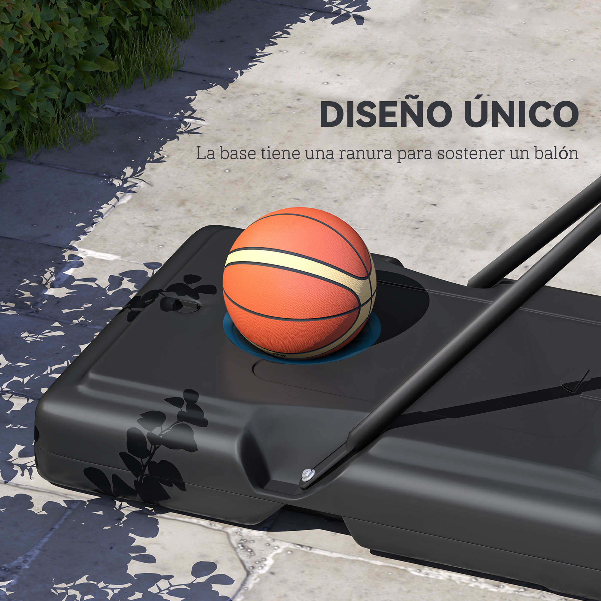 Balón de baloncesto sobre una base negra de canasta. La base tiene una ranura y está sobre hormigón.