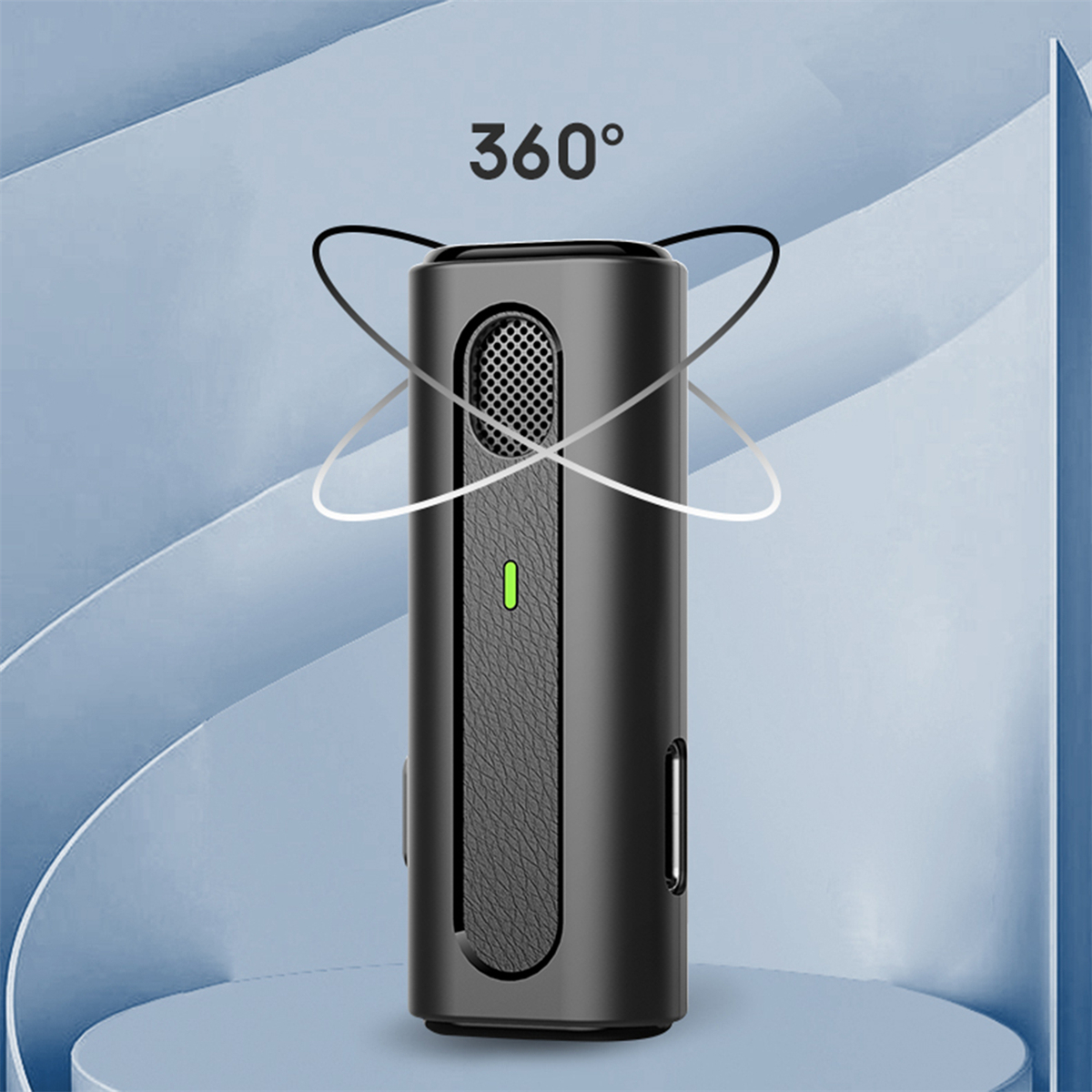 Ein schwarzes Gerät mit 360°-Symbol. Es hat eine Gitterfront und ein grünes Licht.