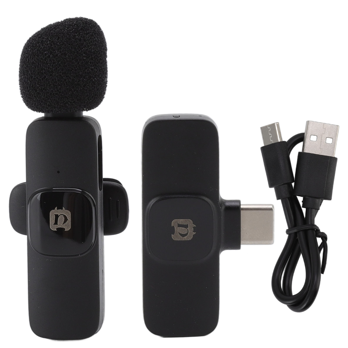 Schwarzes Mikrofon mit flauschiger Abdeckung. Ein schwarzer Sender und ein USB-Kabel sind sichtbar.