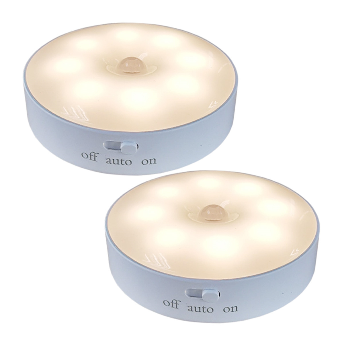 Zwei weiße Lichter mit 'off', 'auto', 'on' Schalter auf weißem Untergrund.