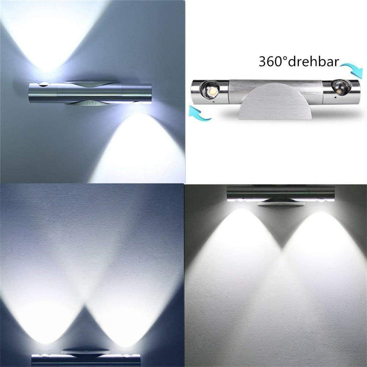 Silberne Wandleuchte mit zwei verstellbaren Lichtern. Das Licht scheint auf die Wand.