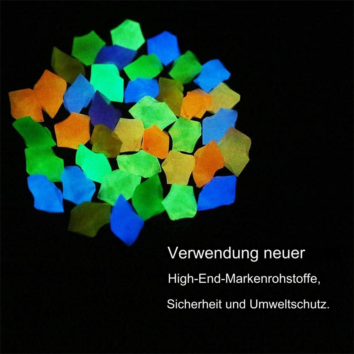 Leuchtende, farbenfrohe, unregelmäßig geformte Steine auf schwarzem Hintergrund. Text auf Deutsch unten.