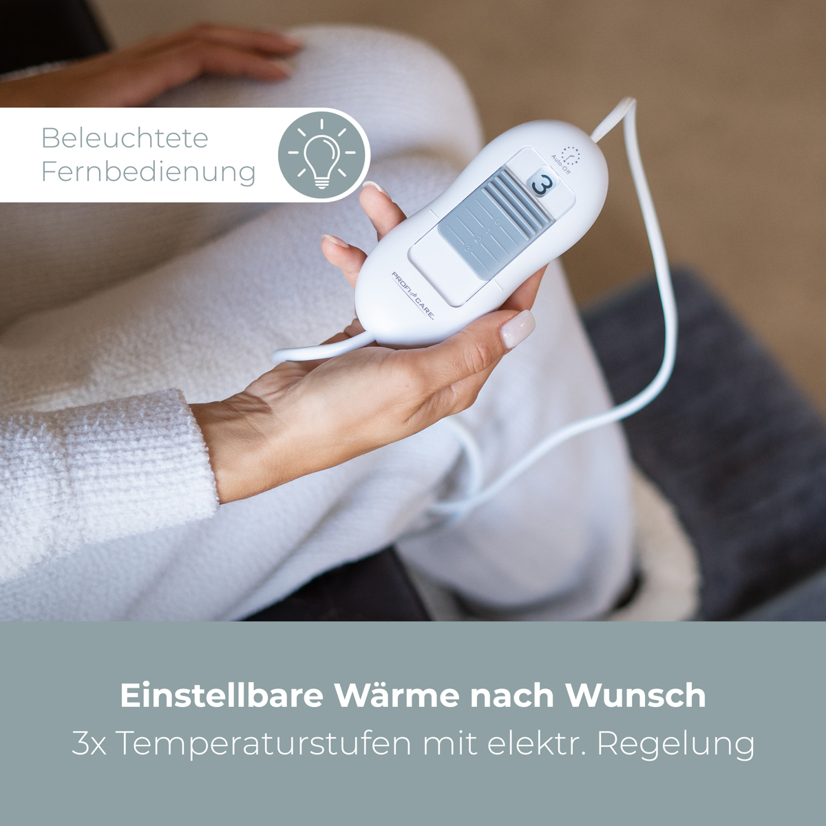 Osoba trzymająca biały pilot do koca elektrycznego. Tekst na obrazku.