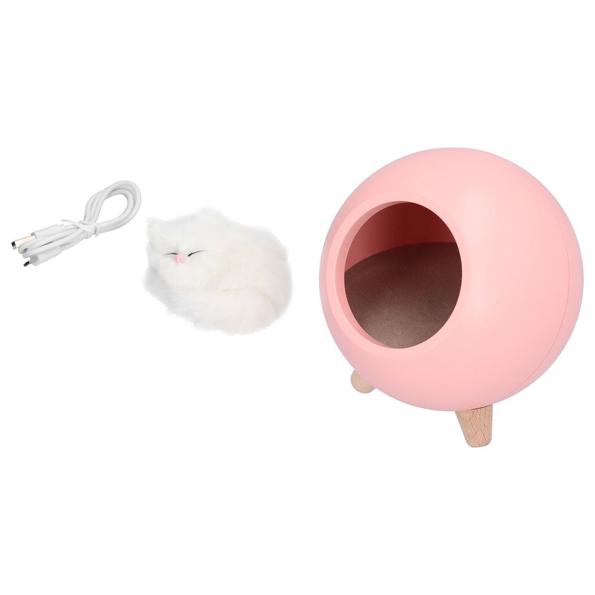 Ein rosa Katzenbett mit Spielzeugkatze und Ladekabel auf weißem Hintergrund.