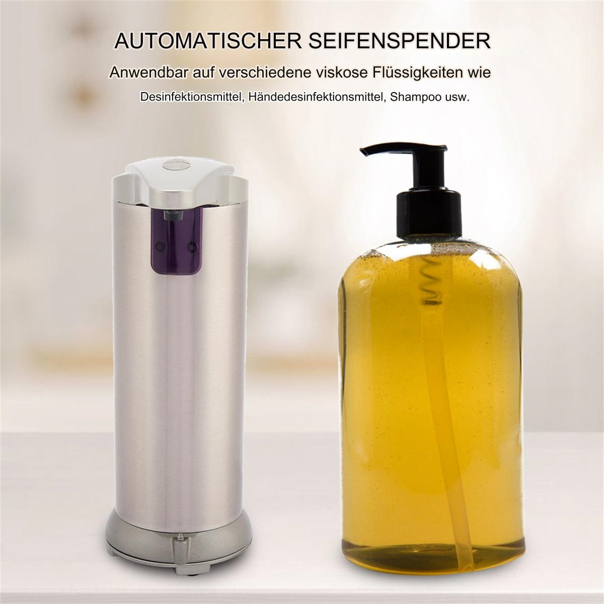 Ein automatischer Seifenspender und eine Seifenflasche stehen auf einer weißen Oberfläche mit deutschem Text darüber.