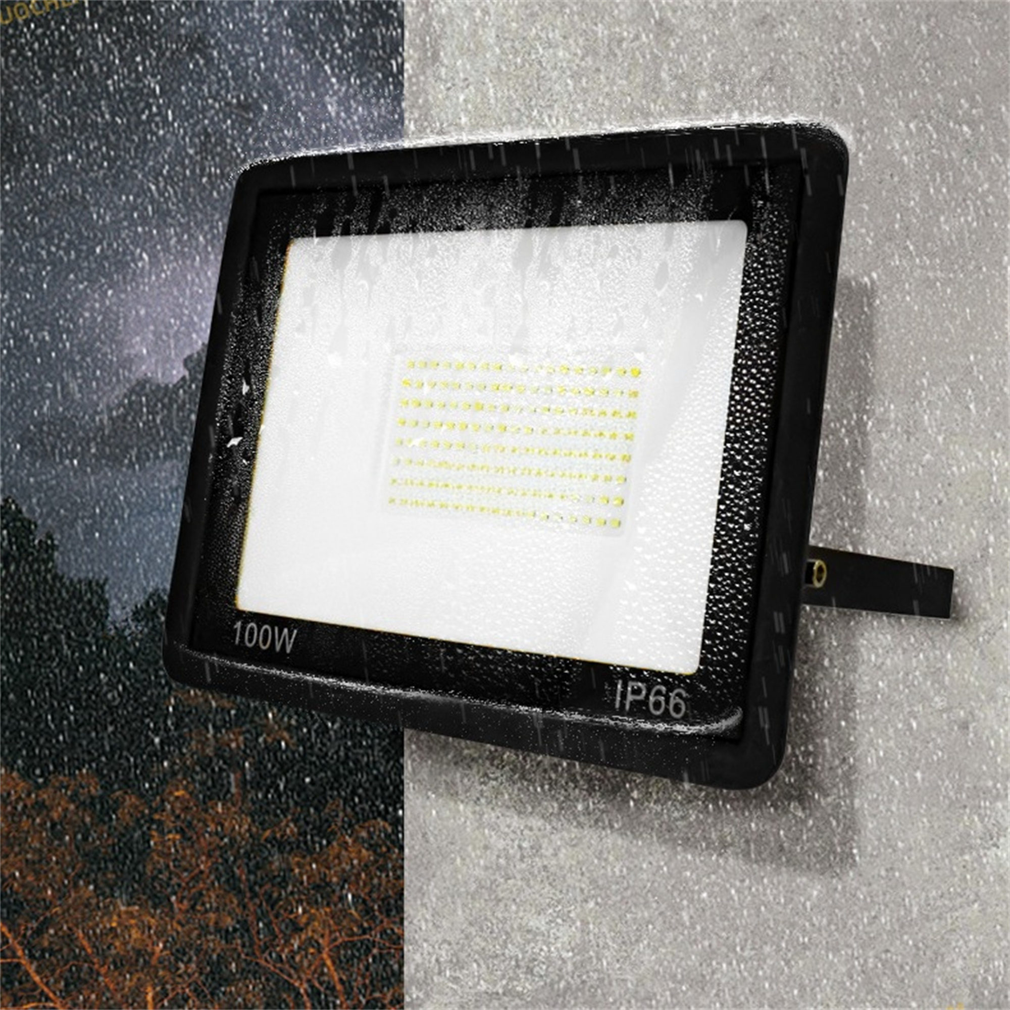 Schwarzer Außenfluter mit weißem Lichtbereich, an einer Wand montiert, mit Regen und dunklem Hintergrund.