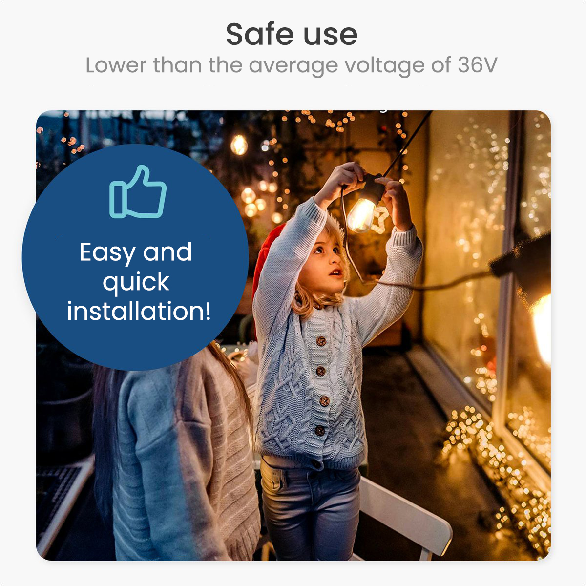 A young girl and woman are installing Christmas lights. A thumbs up icon is in the corner.
