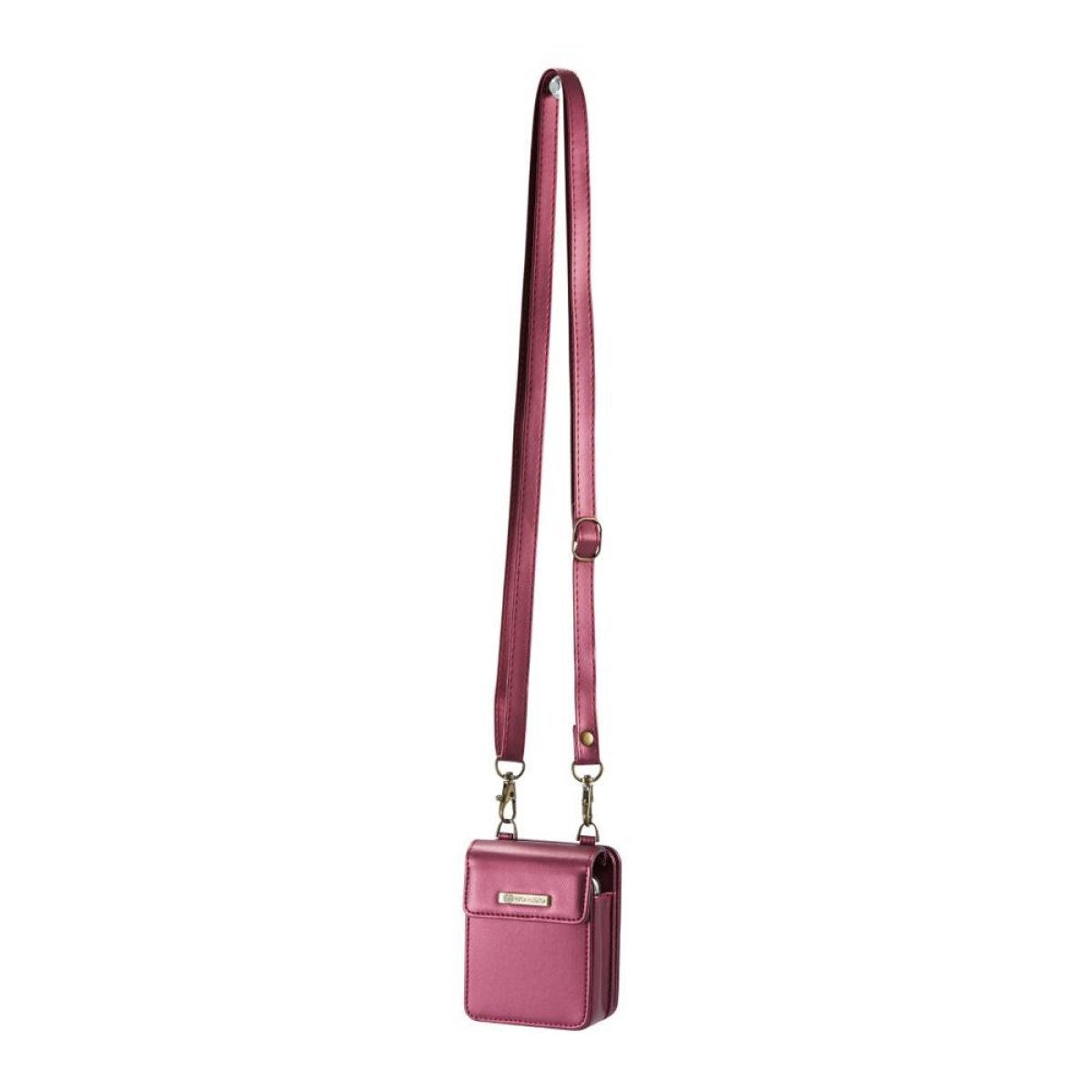 Eine kleine, pinkfarbene Umhängetasche mit langem Riemen hängt von oben. Die Tasche ist geschlossen.