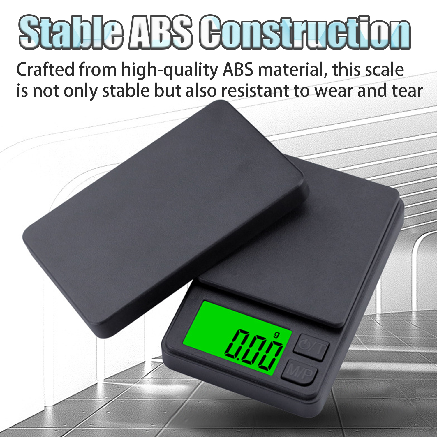 Czarna waga kieszonkowa z zielonym wyświetlaczem pokazującym '0.00', obok pokrywy. Tekst brzmi: "Stable ABS Construction".
