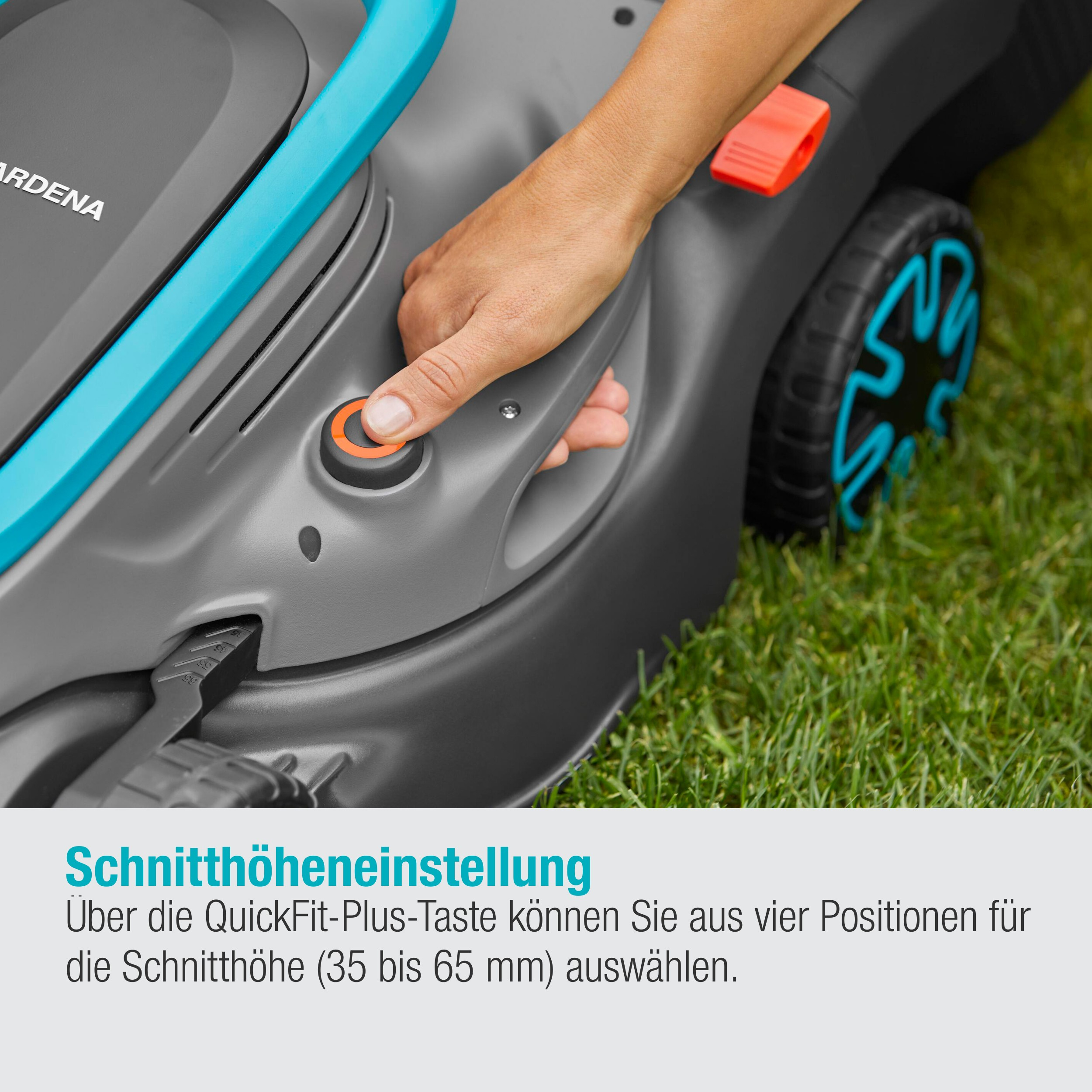 Hand drückt die Starttaste auf einem grauen Rasenmäher. Grüner Gras Hintergrund.