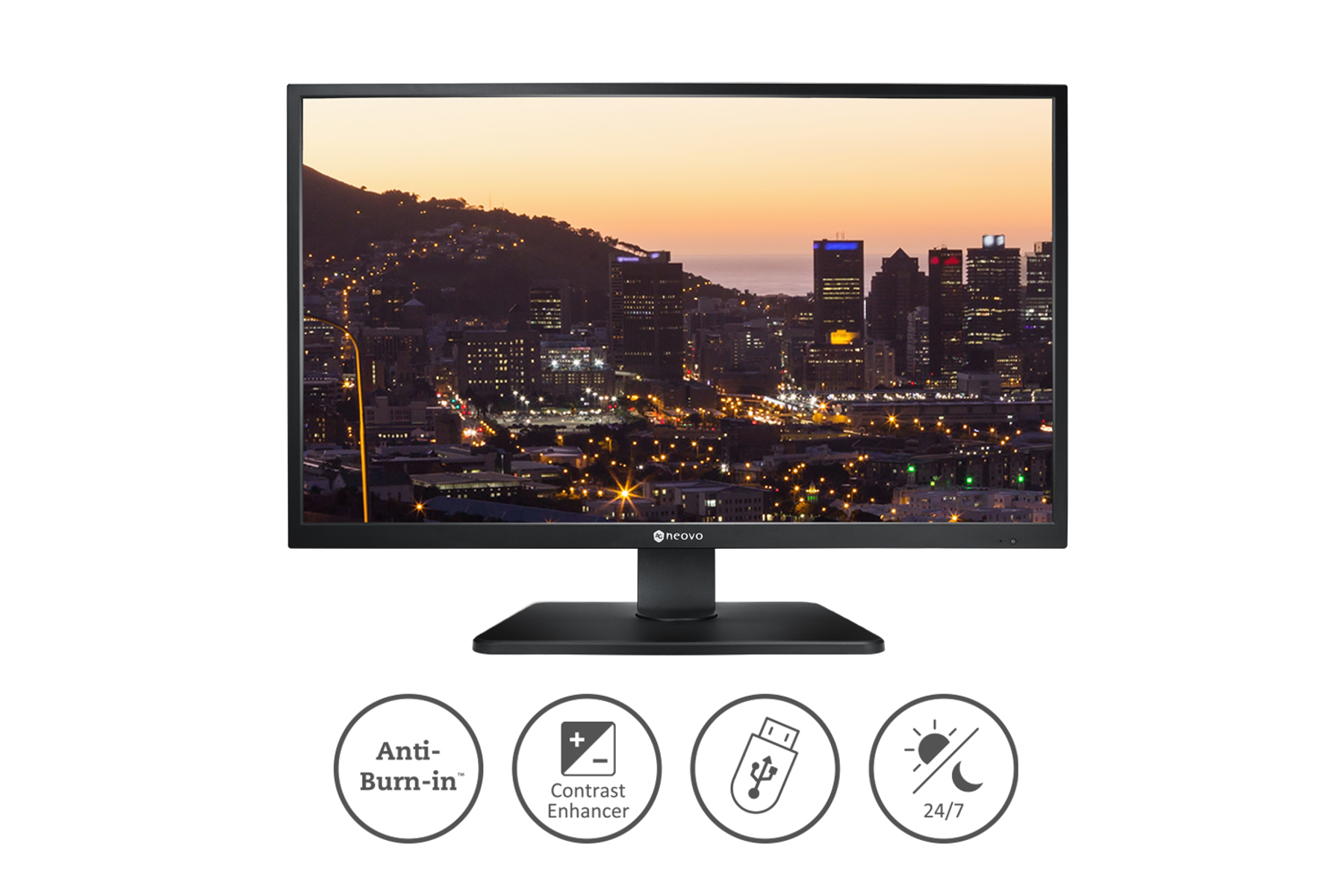 Monitor per computer nero che mostra lo skyline della città al tramonto. Caratteristiche: anti-burn-in, contrasto.