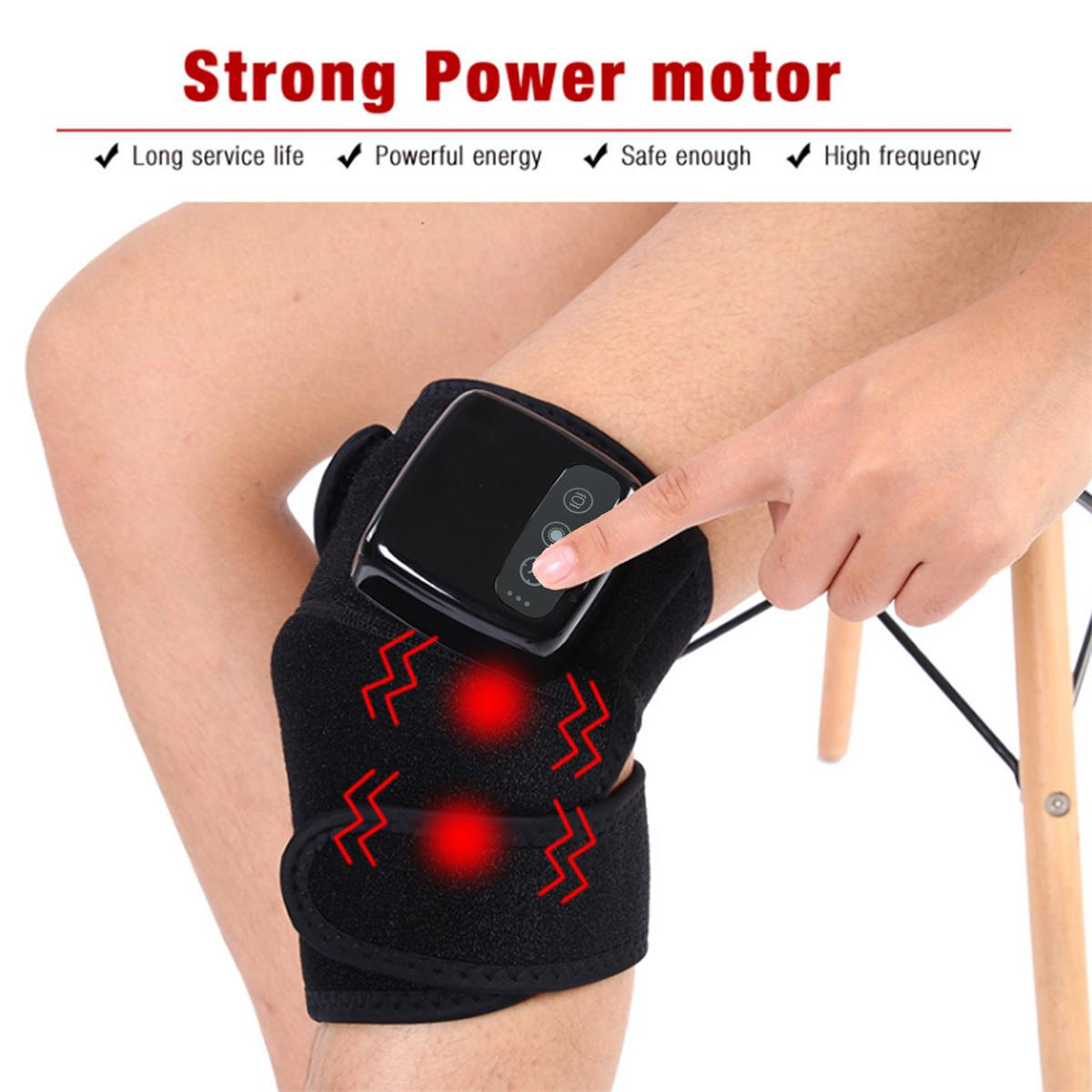 Das Knie einer Person mit einem schwarzen Heizkissen und einem Bedienfeld.