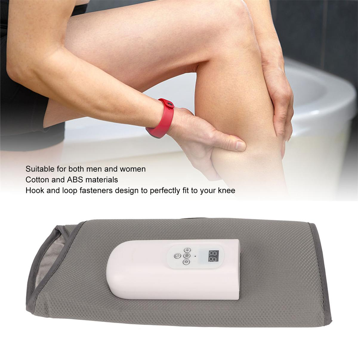 Person massiert Bein, graue Kniebandage mit Bedienfeld.