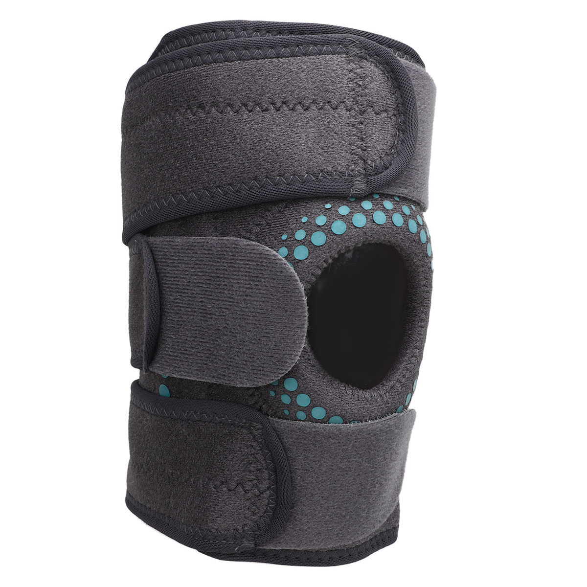 Eine Kniebandage, dunkelgrau mit Klettverschlüssen. Die Bandage hat ein Loch für die Kniescheibe.