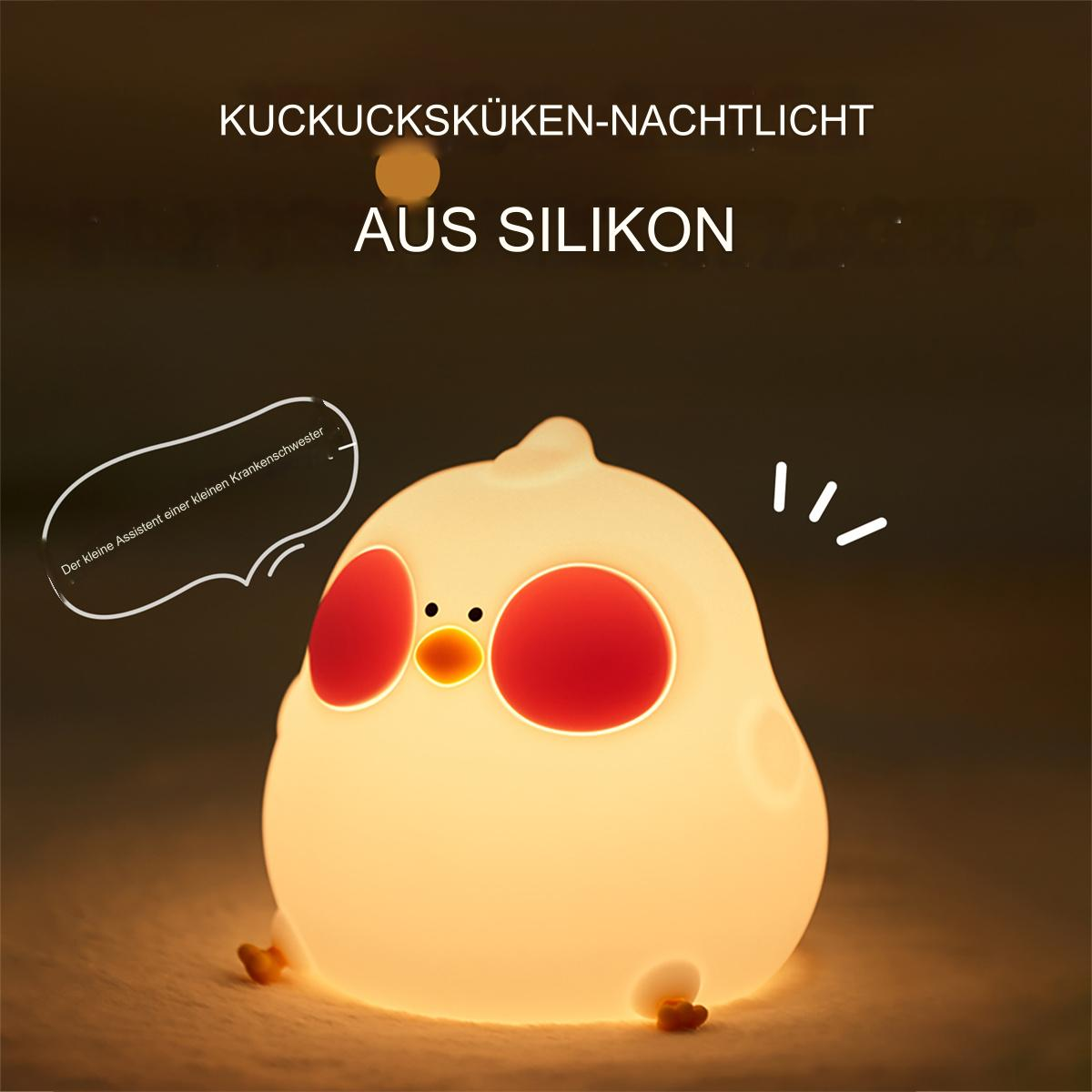 Ein kükenförmiges Nachtlicht mit Lichtquelle und Sprechblase. Das Licht ist sanft gelb.