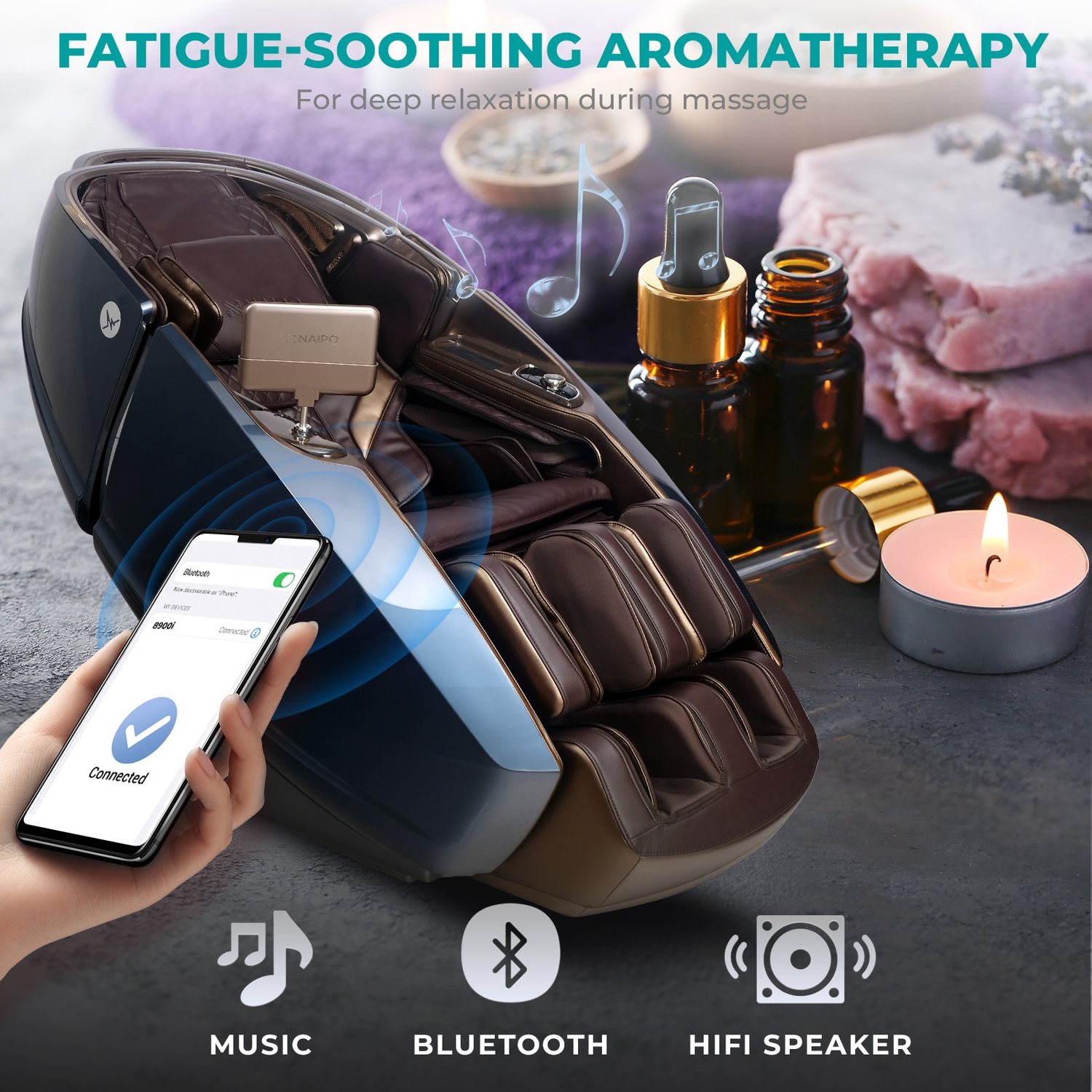 Massagesessel mit angeschlossenem Telefon. Aromatherapie-Artikel, Kerzen und Lautsprecher im Bild.