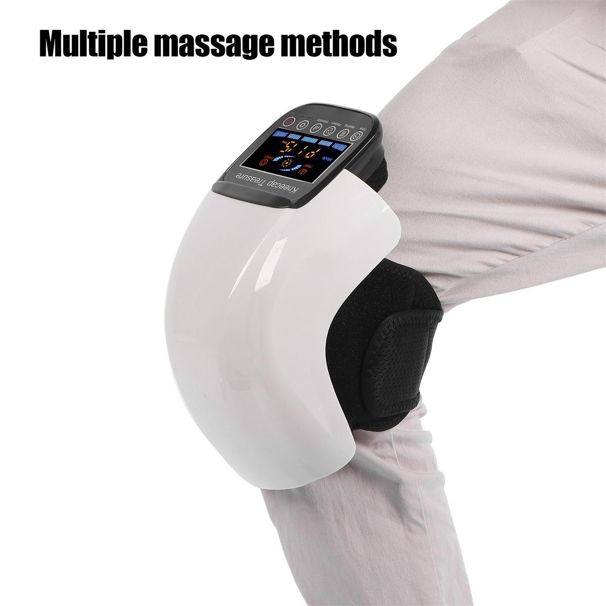 Weißer Kniemassager am Bein mit Bedienfeld.