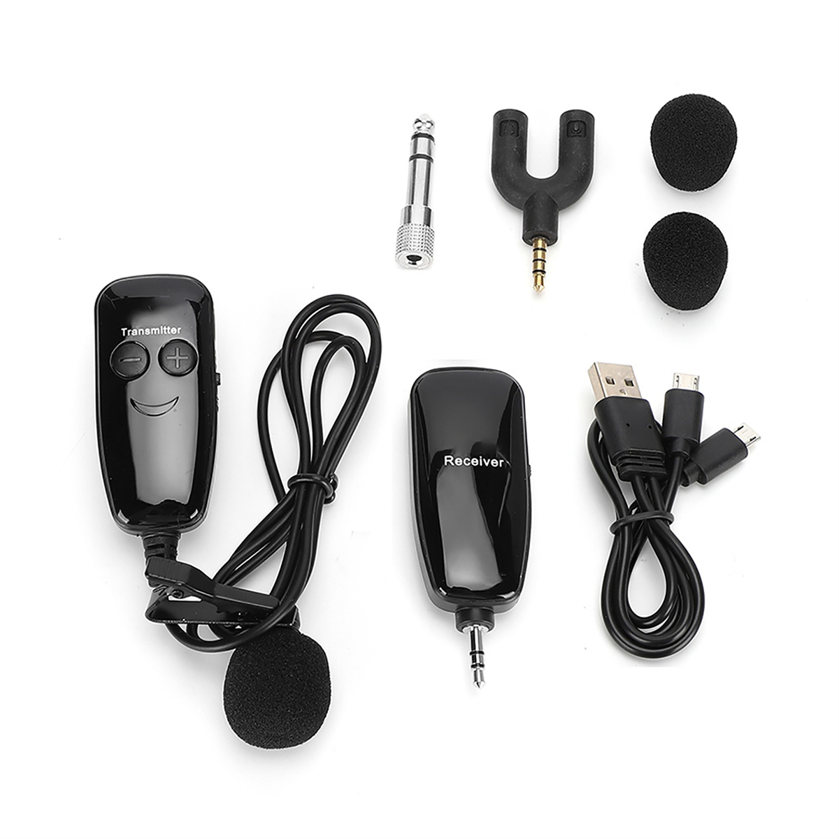 Kabelloses Mikrofonzubehör, darunter ein Sender, Empfänger und verschiedene Kabel und Schaumstoffabdeckungen.