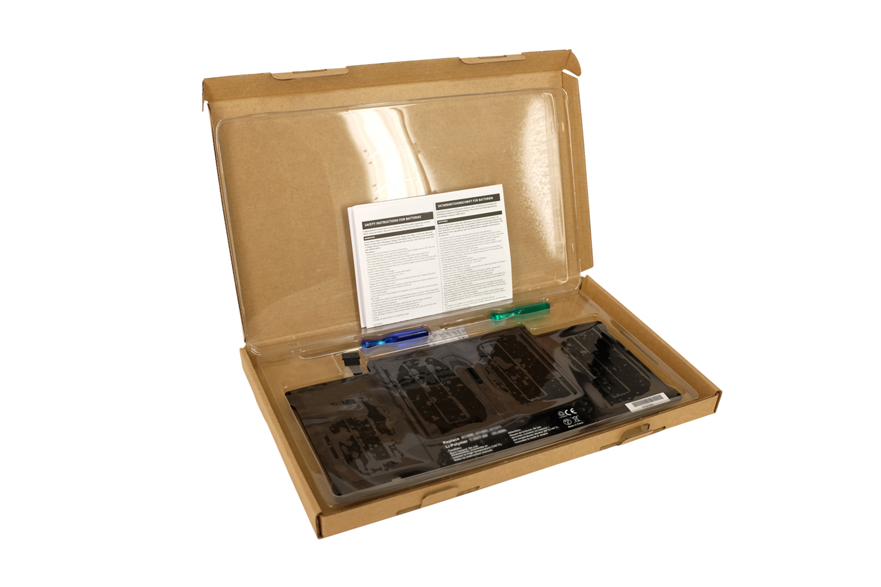 Laptop-Akku in einer Box mit Anweisungen.
