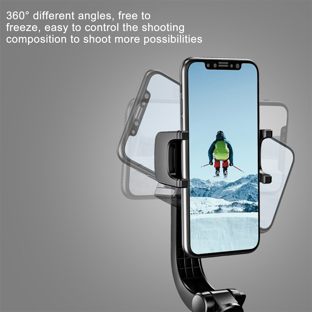 Telefon in schwarzem Halter. Zeigt einen Skifahrer auf einem schneebedeckten Berg. Grauer Hintergrund.