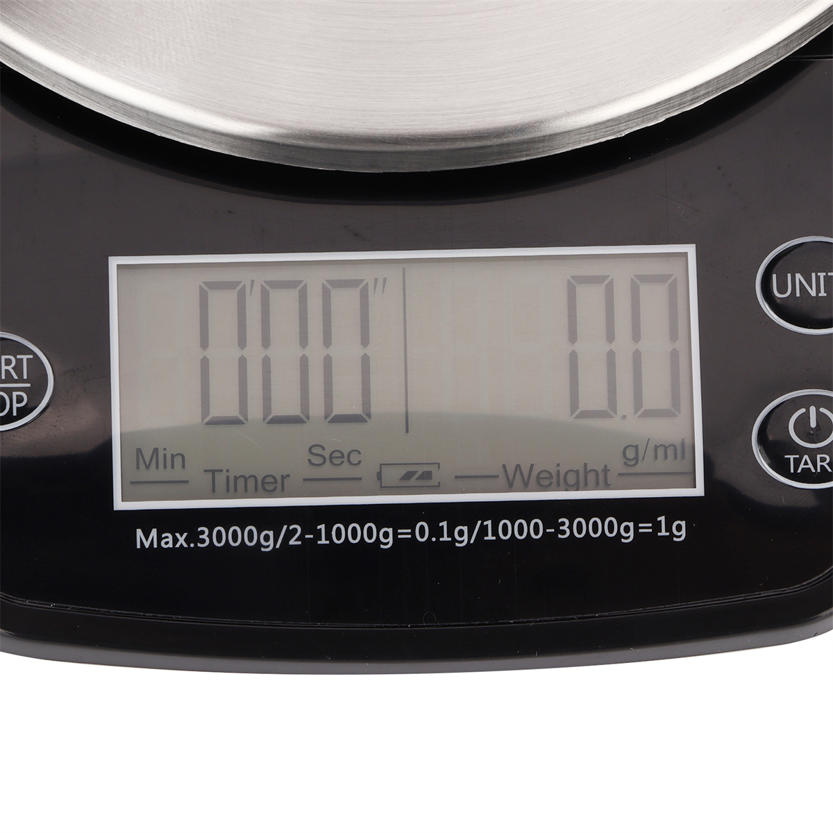 Digitale Küchenwaage mit Anzeige, die Zahlen zeigt. Text: Max. 3000g/2-1000g = 0,1g/1000-3000g = 1g.