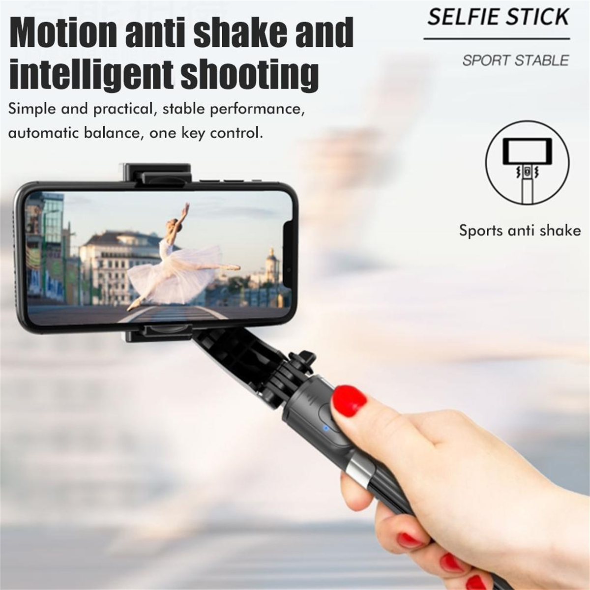 Selfie-Stick mit Telefon, das eine tanzende Frau zeigt. Der Stick hat einen roten Knopf.