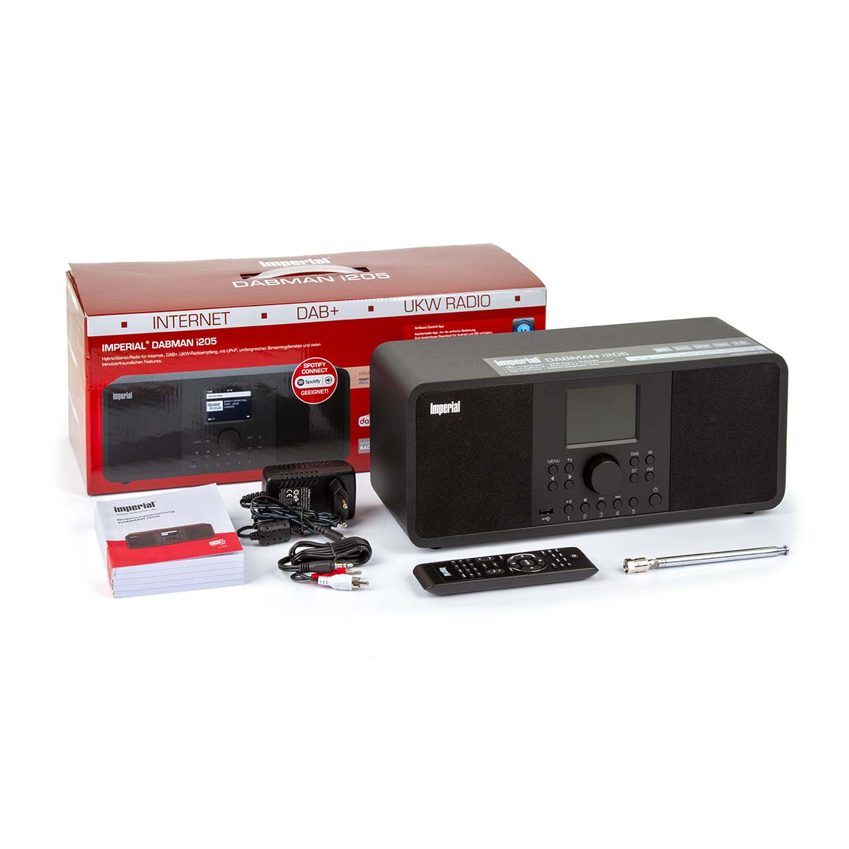 Czarny radioodbiornik Imperial DABMAN i205 z akcesoriami, w tym pudełkiem i pilotem, na białym tle.