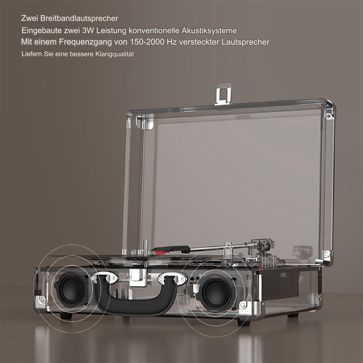 Transparenter Plattenspieler mit offenem Deckel, schwarzen Lautsprechern, Text auf Deutsch.