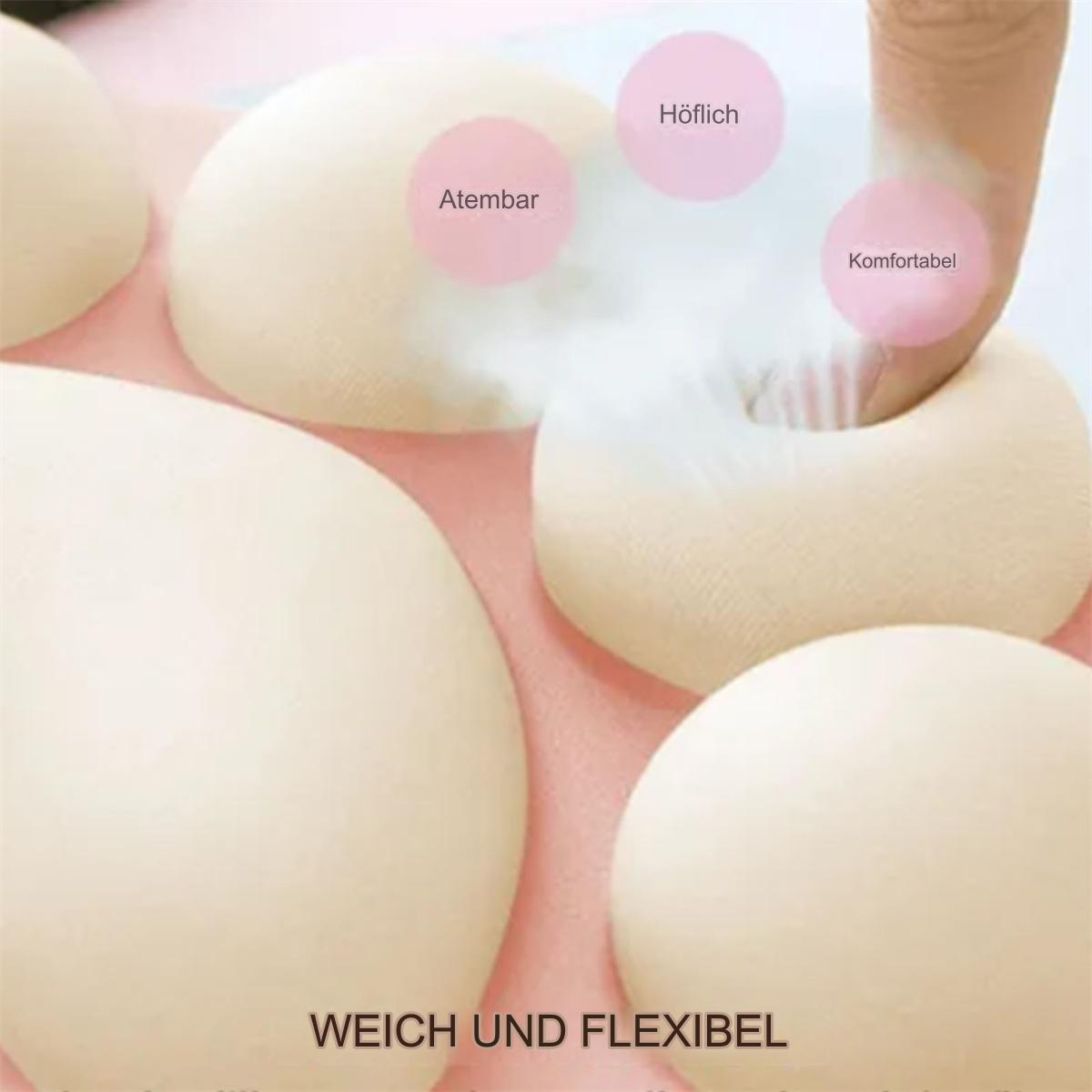 Nahaufnahme von beigefarbenen Stilleinlagen. Wörter beschreiben sie: atmungsaktiv, weich, bequem.