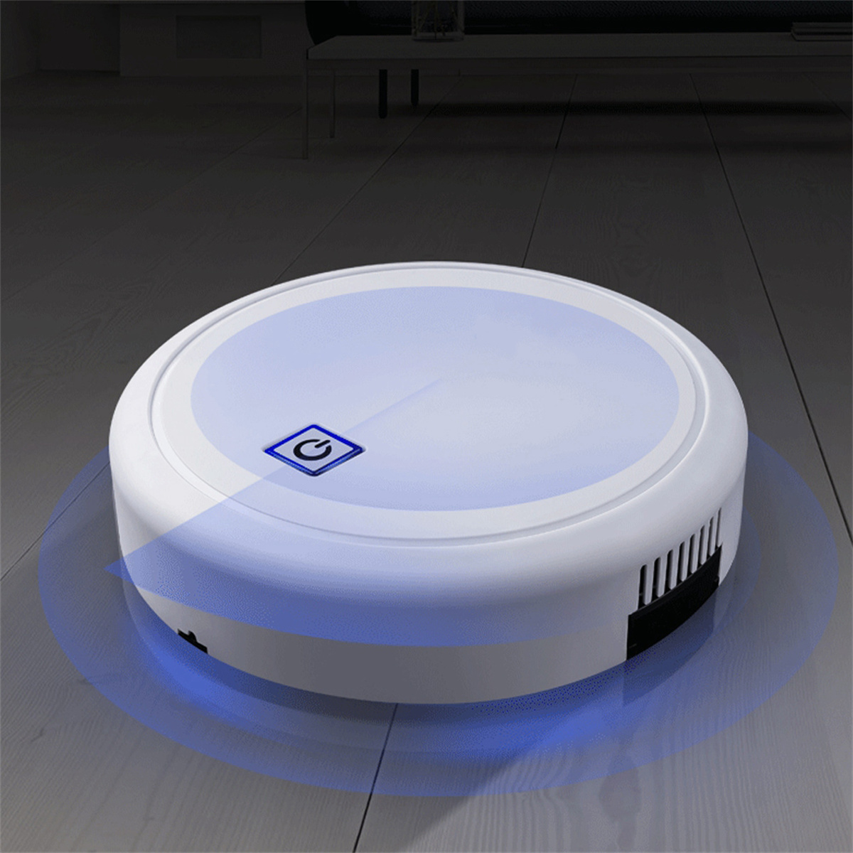 Ein weißer Roboter-Staubsauger mit blauem Licht am Rand, auf einem Holzboden.