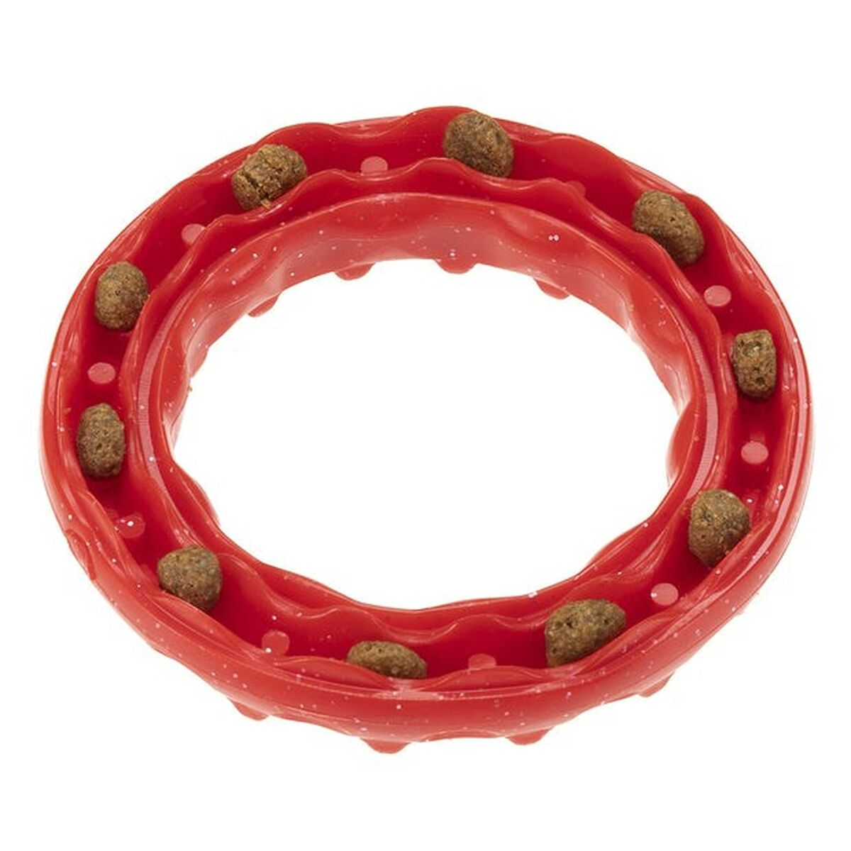 Giocattolo rosso per cani con crocchette negli slot circolari.