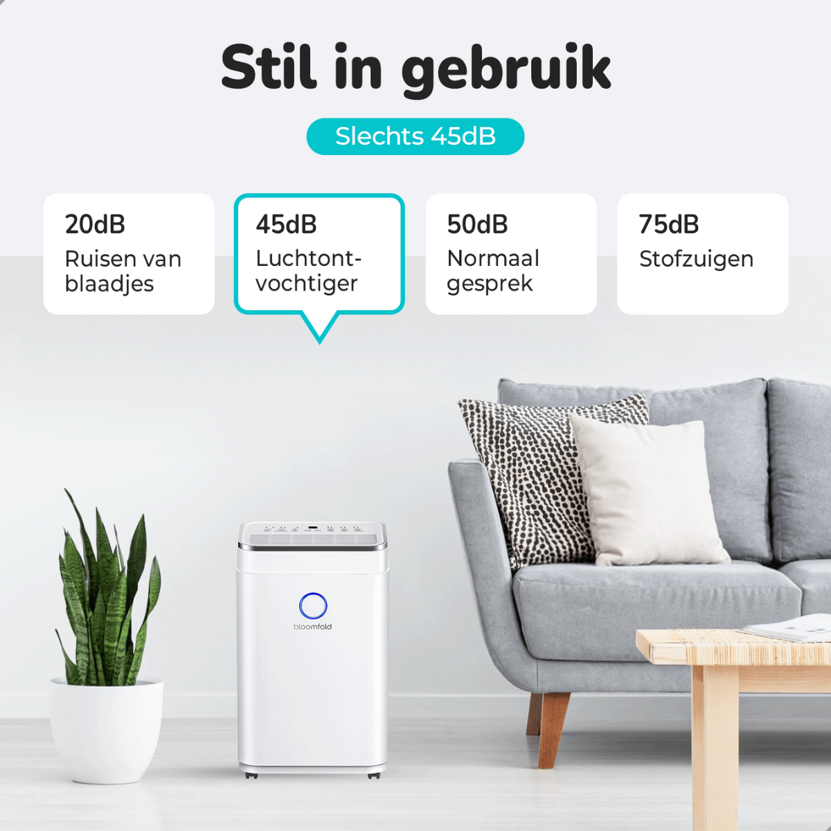 Weißer Luftreiniger mit blauem Licht, neben einer Pflanze, einem Sofa und einem Tisch.