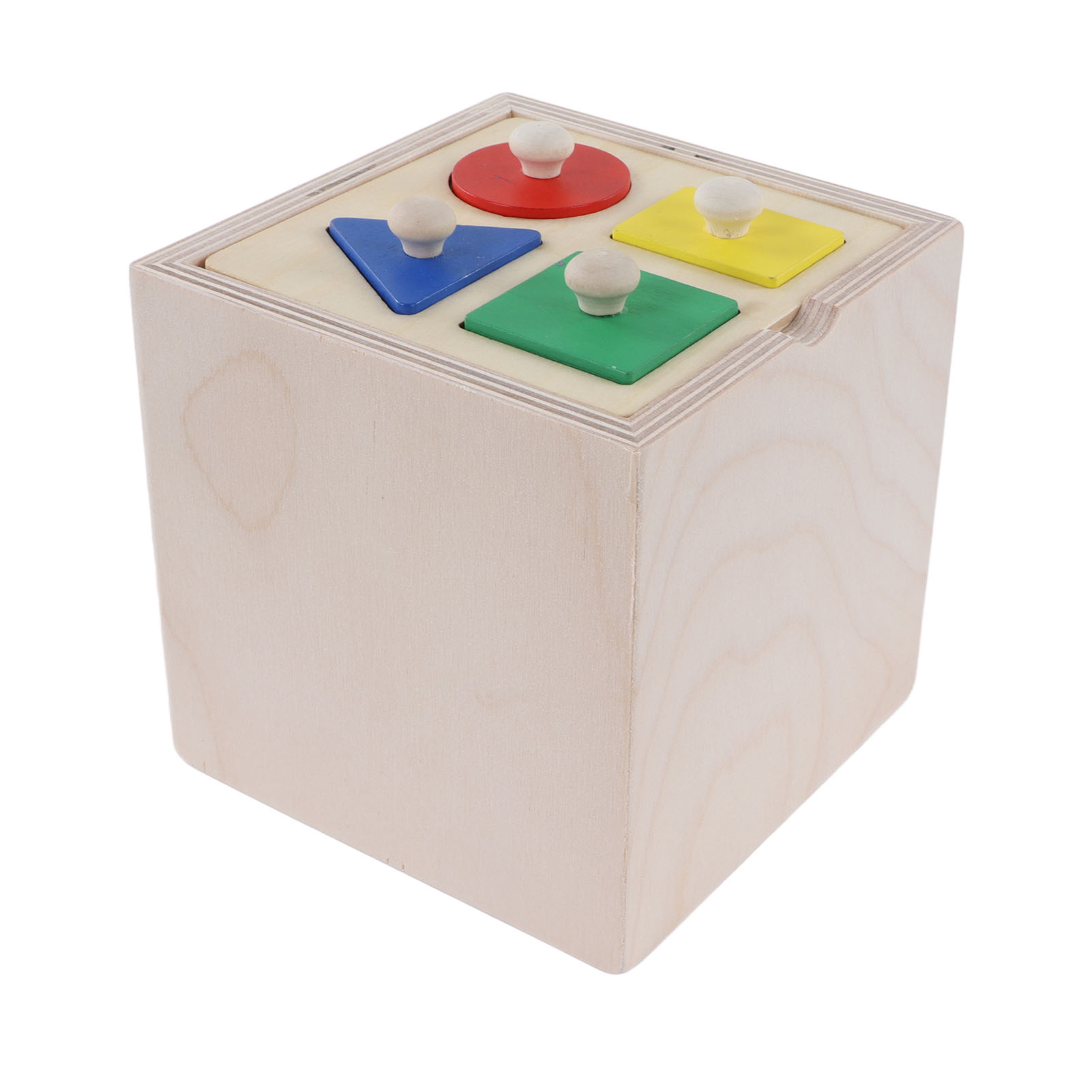 Ein Holzspielzeugwürfel mit vier farbigen Löchern und Stiften: rot, blau, gelb und grün.
