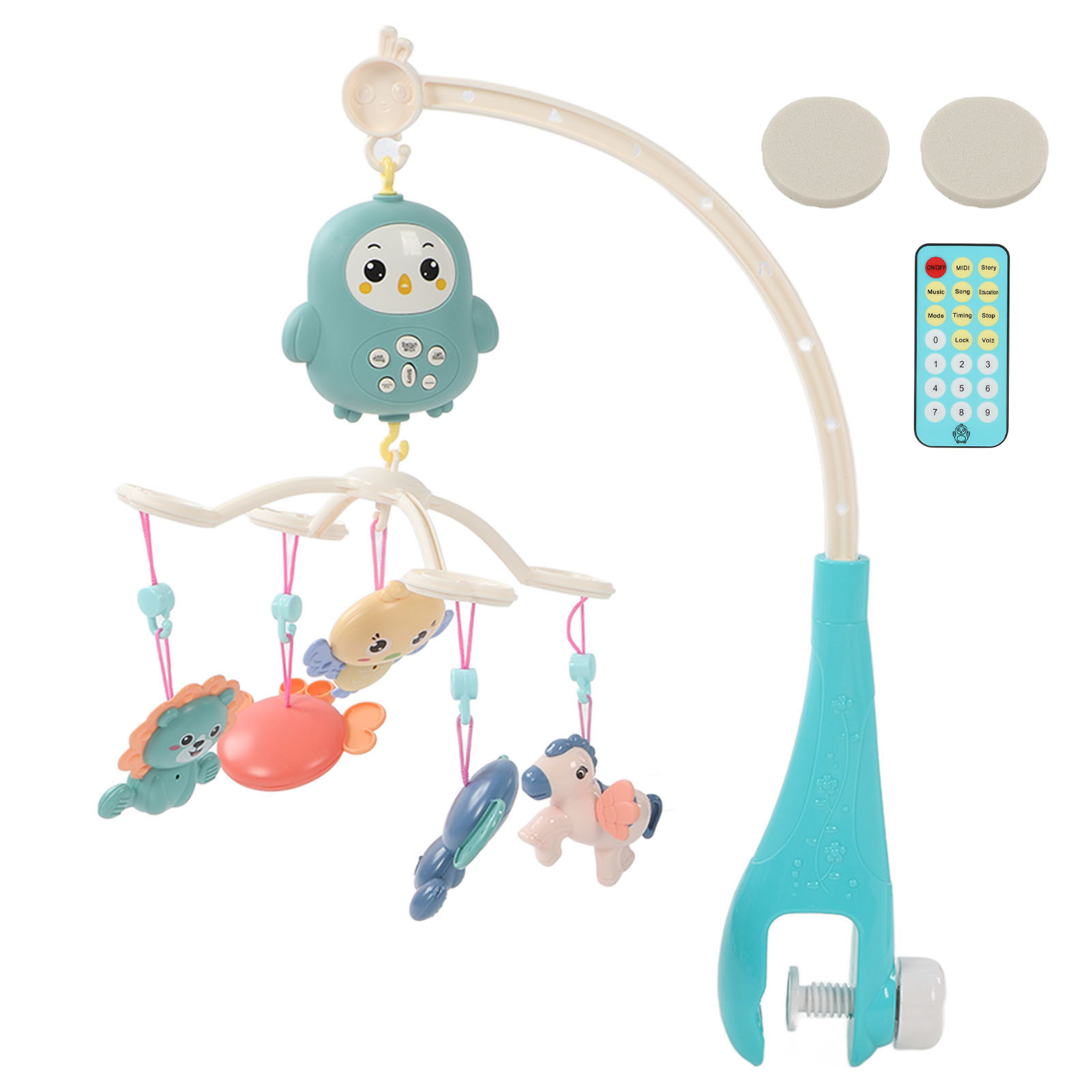 Babymobile mit Eule, hängenden Spielzeugen und Fernbedienung. Beige- und Türkistöne dominieren.