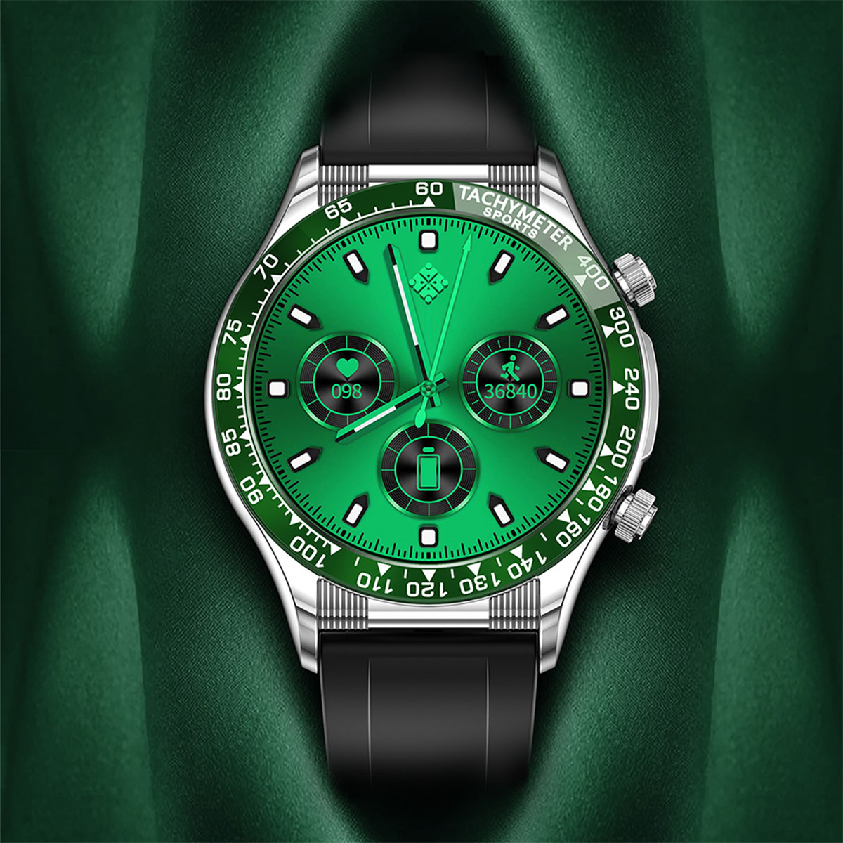 Grüne und silberne Smartwatch mit rundem Zifferblatt, das eine grüne Oberfläche anzeigt. Schwarzes Band und grüner Stoffhintergrund.